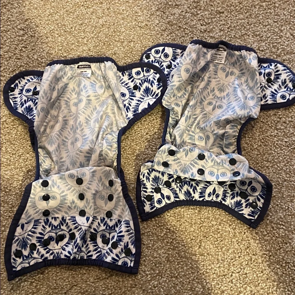 Thirsties size 2 cloth diaper covers. Owl faces. 18-40lbs.